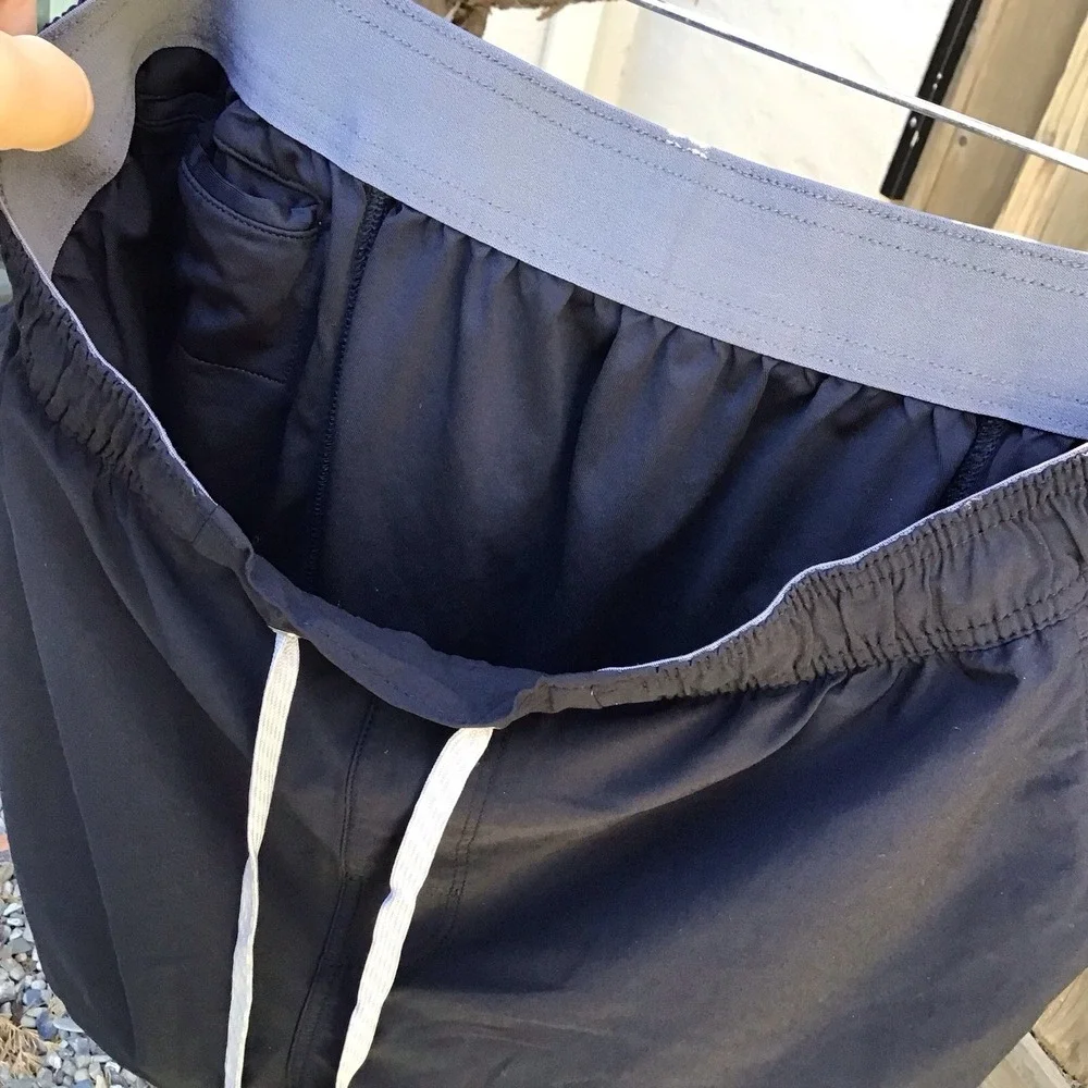 Vuori Black Athletic Shorts with Light Gray Drawstring